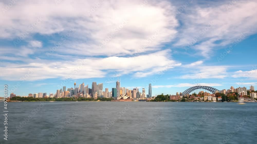 Slow zoom time lapse across Sydney harbour toward Opera House Slow zoom time lapse across Sydney harbour toward Opera House