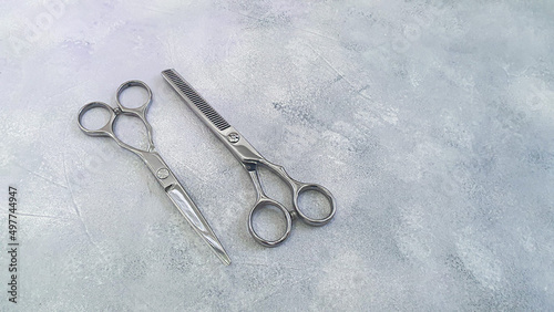 Special hairdressing scissors and comb. Professional equipment.