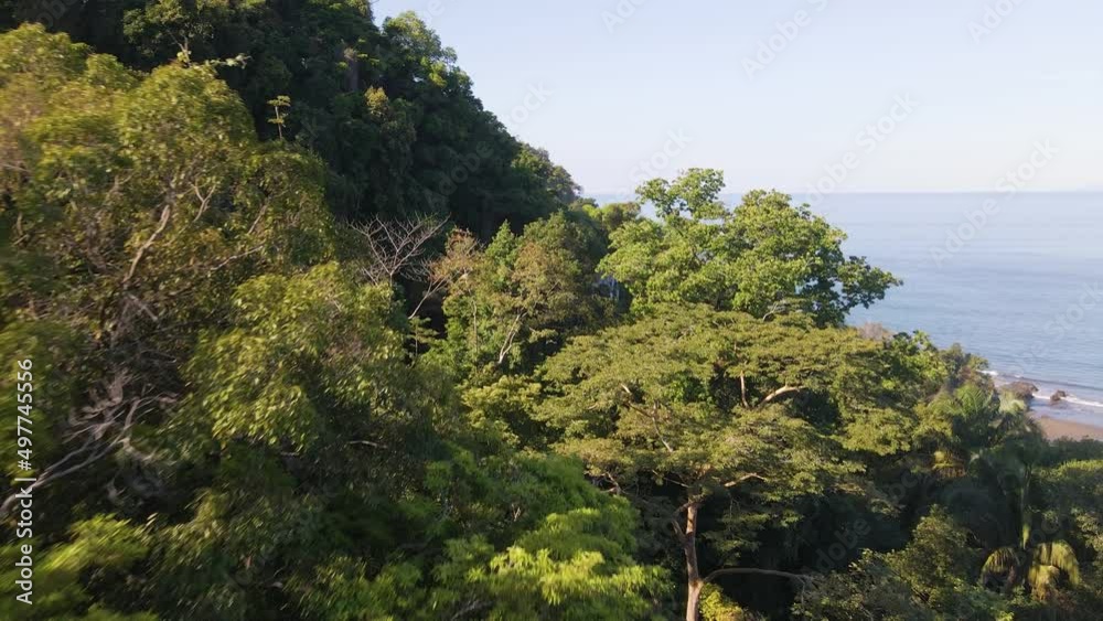 Picturesque lookout of El Miro by the tropical, coastal town of Jaco on the Pacific Coast of Costa Rica. Aerial flyover shot Picturesque lookout of El Miro by the tropical, coastal town of Jaco on the Pacific Coast of Costa Rica. Aerial flyover shot