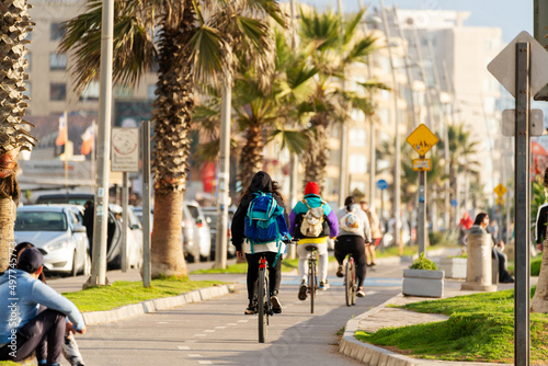 Wallpaper Mural unknown people commuting by bike in the street of La Serena Torontodigital.ca