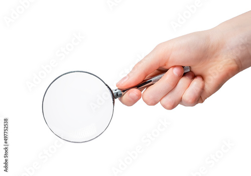 Hand holding magnifying glass isolated on white background. Information search, data analysis and verification concept. Accessory for people with poor eyesight or for spy, detective profession. photo