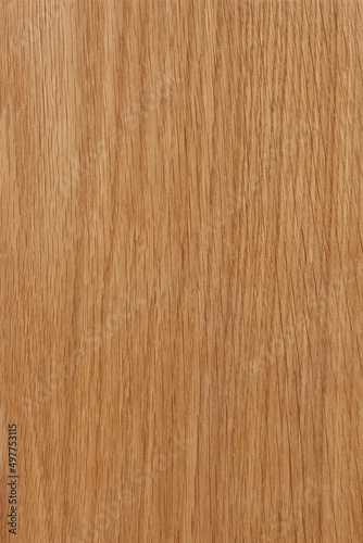 Vertical closeup of a solid piece of hardwood.