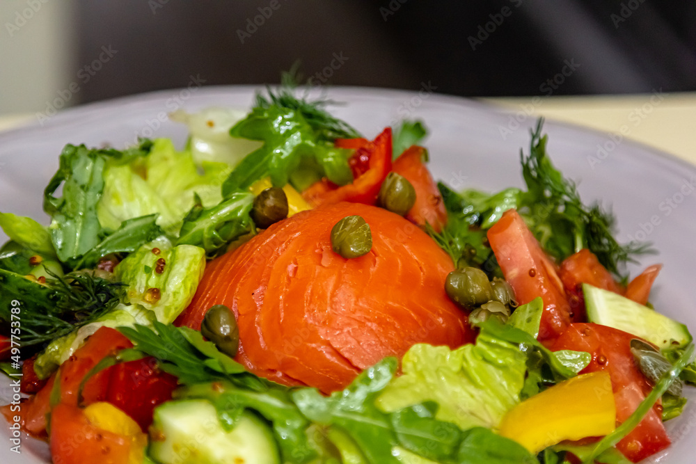 Salad with salmon, cucumbers, tomatoes and beets Salad with salmon, cucumbers, tomatoes and beets
