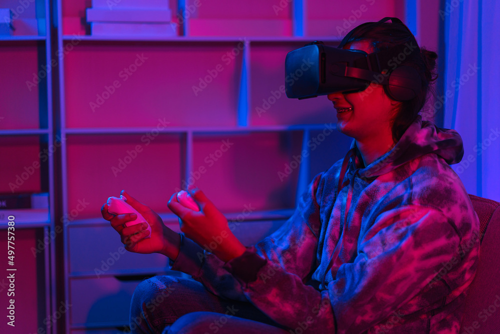 Metaverse technology concept, Man playing games with virtual reality goggles in metaverse Metaverse technology concept, Man playing games with virtual reality goggles in metaverse