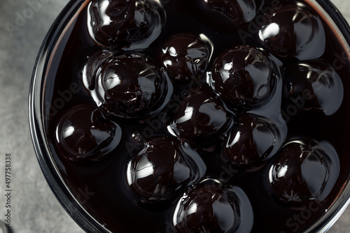 Organic Boozy Dark Maraschino Cherries photo