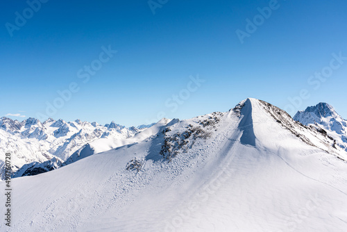 Panorama of winter snowy mountains in Caucasus region, Russia © SDF_QWE