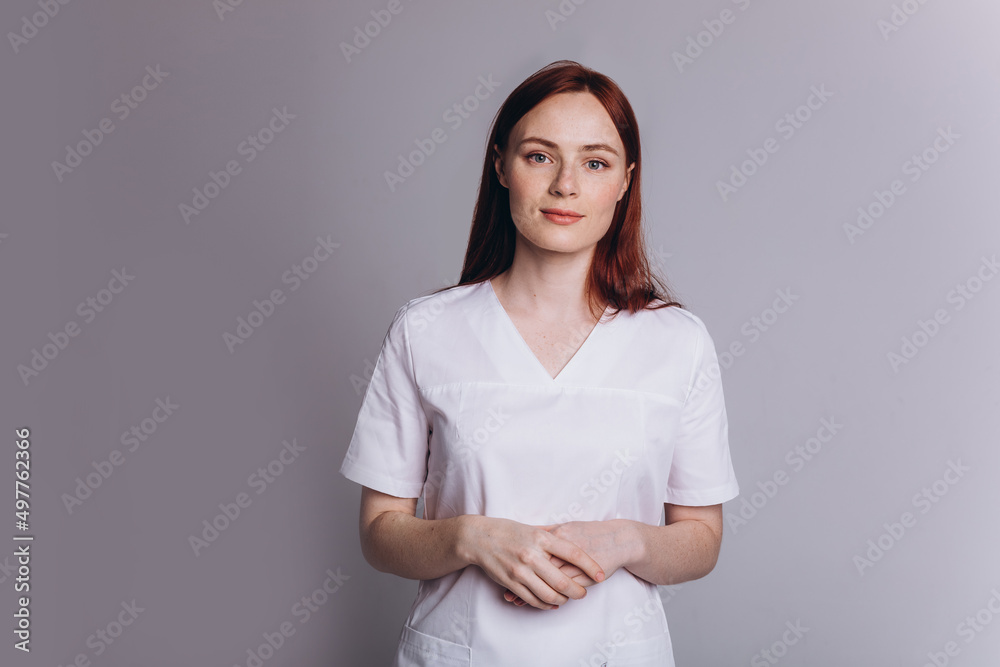 Beauty woman doctor in medical uniform on isolated background. Protection, epidemic, medicine, health care lifestyle concept Beauty woman doctor in medical uniform on isolated background. Protection, epidemic, medicine, health care lifestyle concept