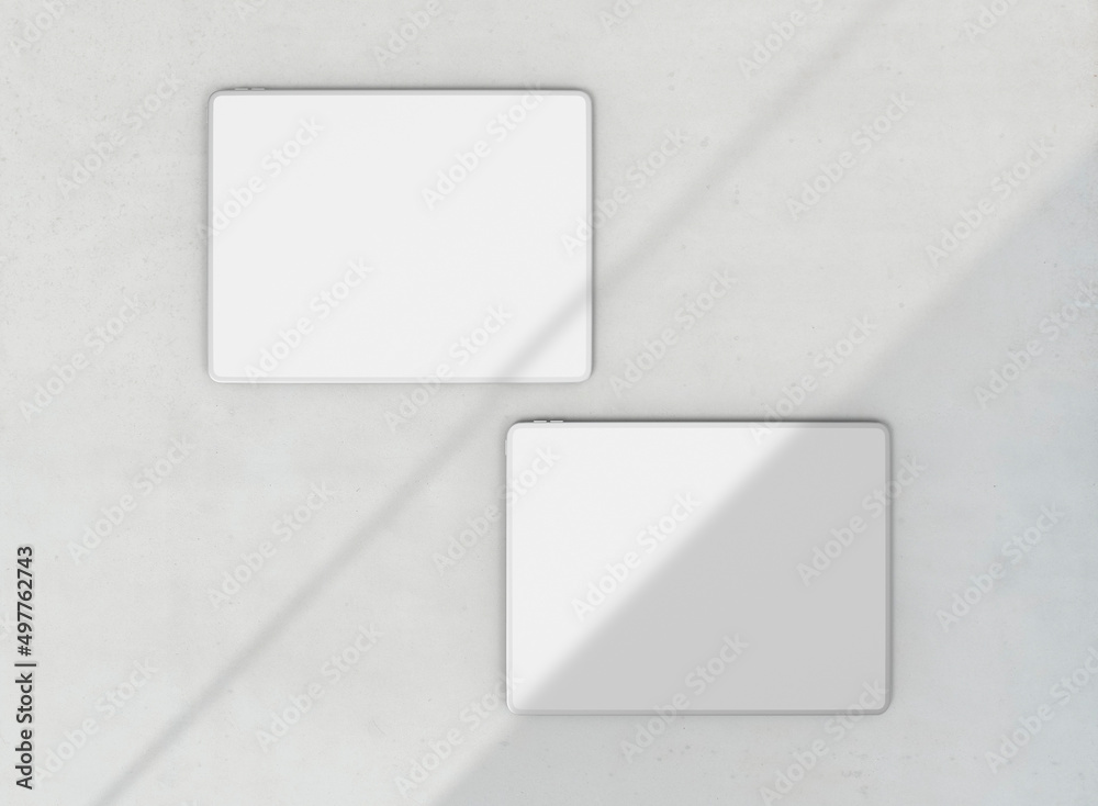 3d Top View of Two Tablet Mockup with Shadow on Concrete Background 3d Top View of Two Tablet Mockup with Shadow on Concrete Background