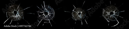 Foto holes from balls in glass on a black background, collection.