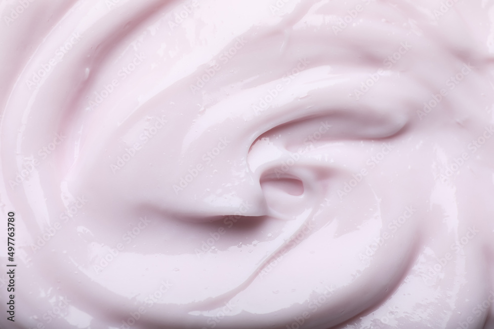Closeup view of light pink body cream as background Closeup view of light pink body cream as background