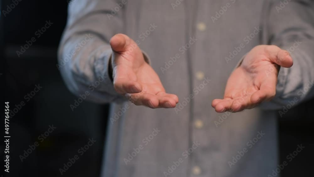 Shaking palms of a man suffering from essential tremor close-up.Parkinson's disease. Shaking palms of a man suffering from essential tremor close-up.Parkinson's disease.