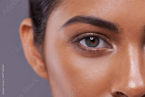 Her eyes can light up the room. Closeup portrait of a beautiful young woman in the studio.