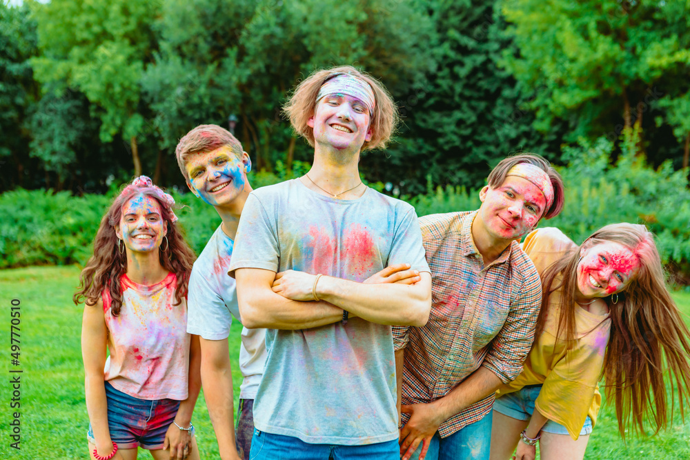Fototapeta premium young happy friends at holi fest