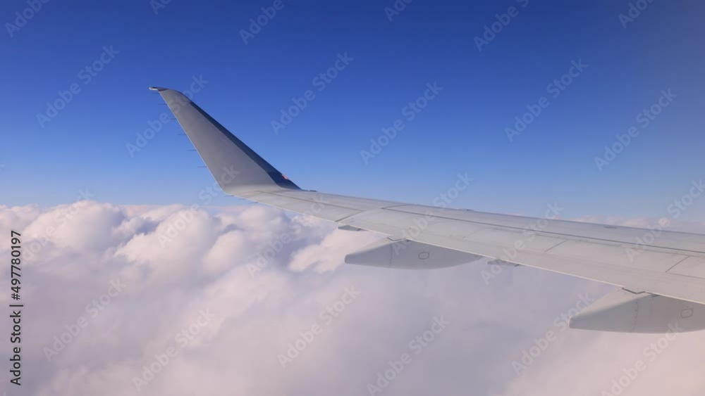 Aerial view of blue sky and clouds from an airplane