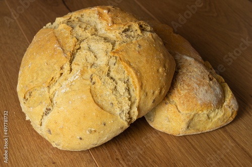 loaf of sourdough bread, home made freshly baked natural ingredients, freshness, trendy, close-up.