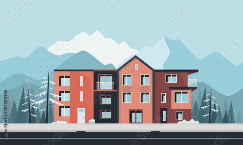 Colorful houses with mountains in a background