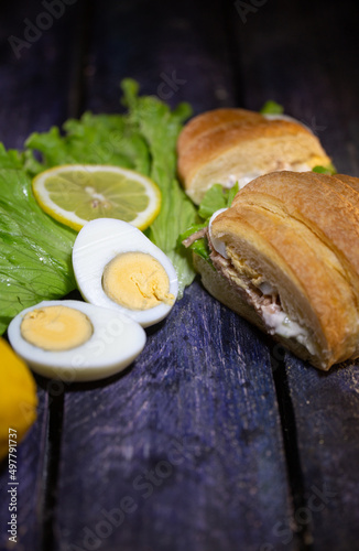 delicious crispy croissant sandwich with egg and tuna