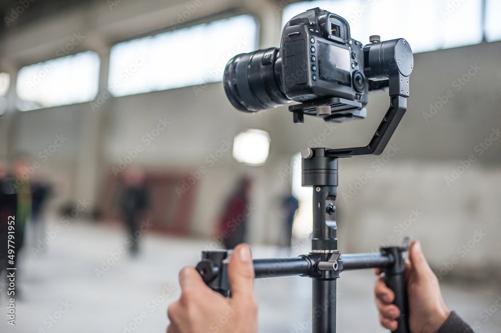 Man hand holding camera and take the photo Man hand holding camera and take the photo