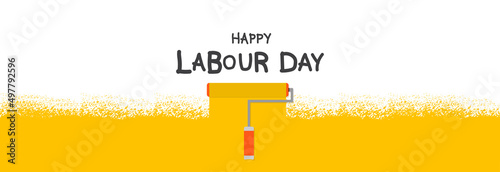 Happy Labor Day, construction roller paints the wall yellow.