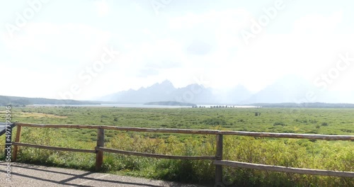 Wallpaper Mural Grand Tetons viewpoint looking over fence at mountains. Panning left to right Torontodigital.ca