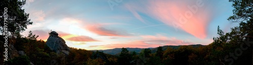 bright sunrise in the mountains with blue sky