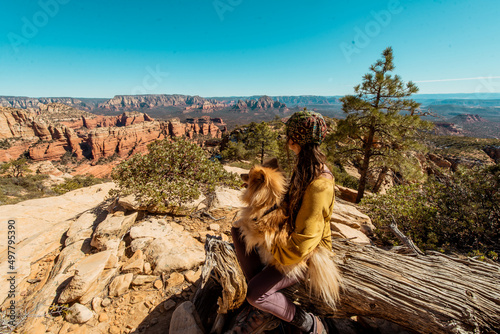 Woman and Dog on a summit