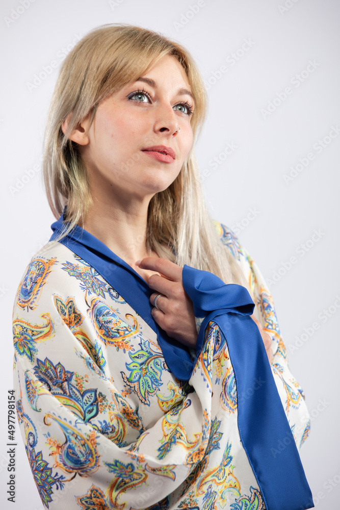 Young beautiful woman in a colorful trendy and fashionable kimono. Young beautiful woman in a colorful trendy and fashionable kimono.