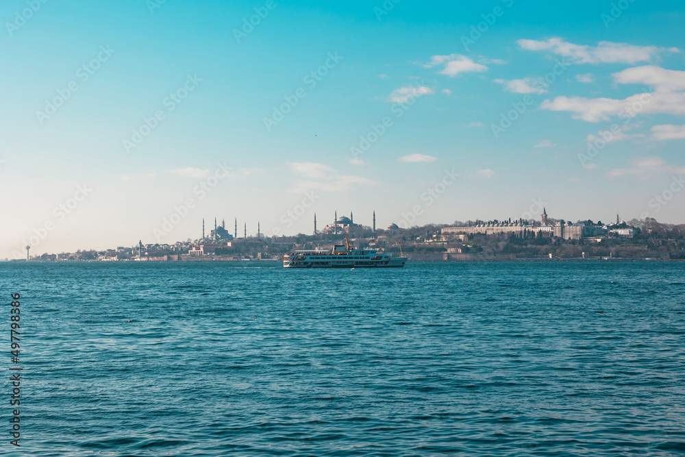 Istanbul view. Cityscape of Istanbul and a ferry at daytime