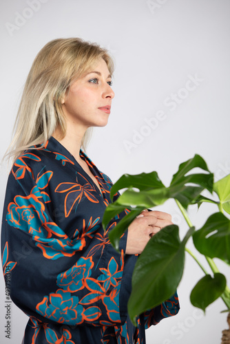 Young beautiful lady in a colorful trendy and fashionable kimono.