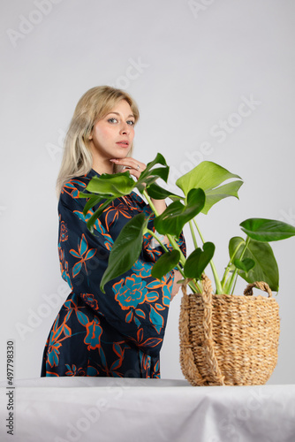 Young beautiful lady in a colorful trendy and fashionable kimono.