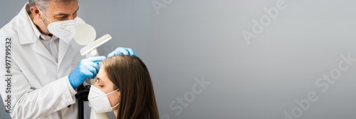 Dermatologist Doctor Checking Woman Hair For Dandruff