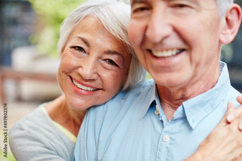 Im still hopelessly in love with my husband. Portrait of a happy senior couple outdoors.