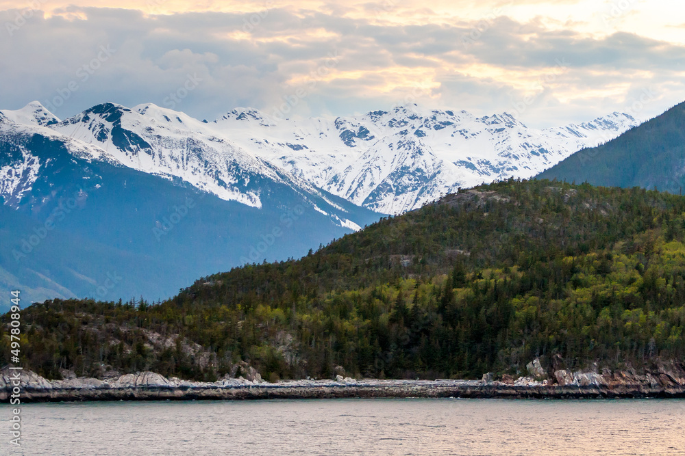 Snow-capped mountains along the Chilkoot Inlet in Alaska