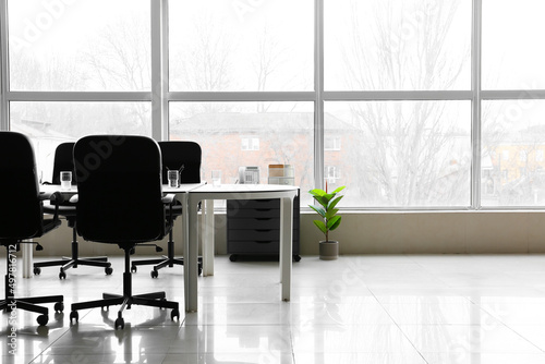 Table and chairs in interio...