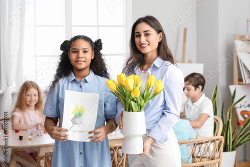 Teacher and cute African-Am...