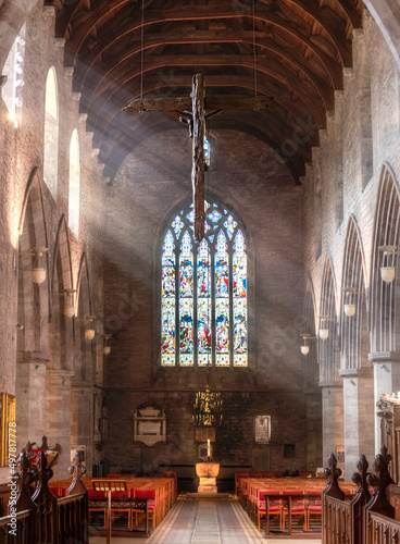 Interior of Brecon Cathedral Church,sun shining through side windows,Brecon,Powys,Wales,UK.