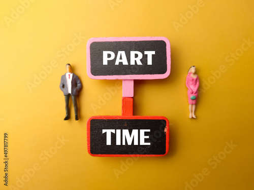Obraz na plátně Wooden board and miniature people with text PART TIME on a yellow background