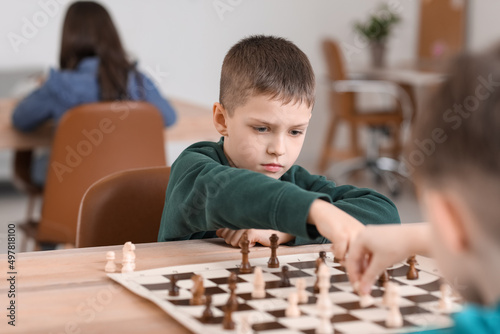Little children playing che...