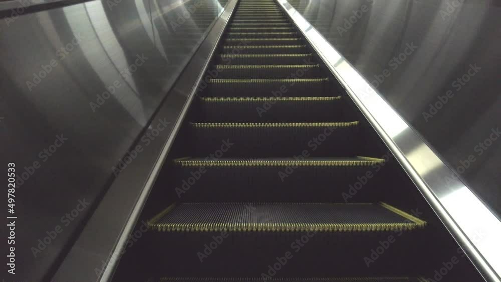 Tokyo, Japan - March 6, 2022: Vacant escalator moving upward in Japan
Tokyo, Japan - March 6, 2022: Vacant escalator moving upward in Japan
