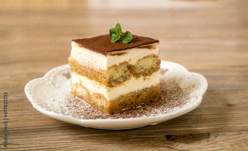 Fresh Tiramisu Cake, white background Fresh Tiramisu Cake, white background
