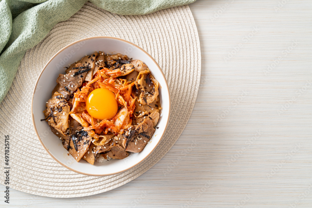 Fototapeta premium pork bulgogi rice bowl with kimchi and Korean pickled egg