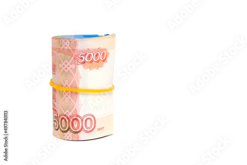 Roll of banknotes, Russian rubles with face value five thousand white background.
