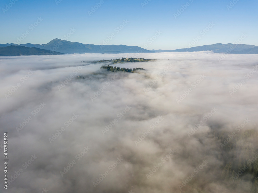 Morning fog in the Ukrainian Carpathians. Aerial drone view. Morning fog in the Ukrainian Carpathians. Aerial drone view.