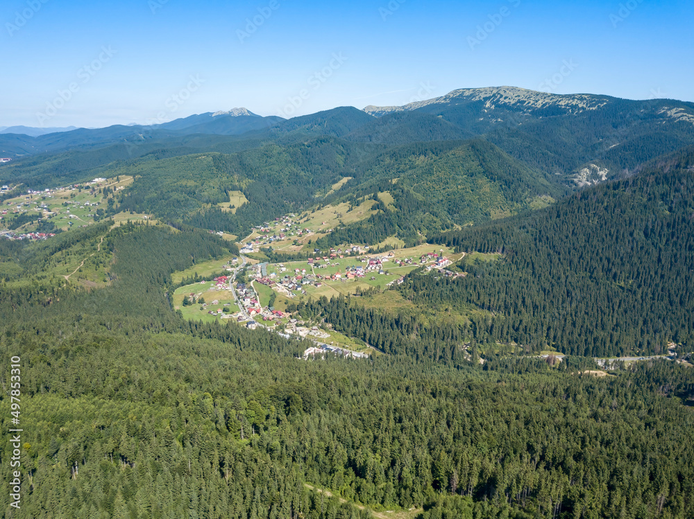 Green mountains of Ukrainian Carpathians in summer. Sunny clear day. Aerial drone view. Green mountains of Ukrainian Carpathians in summer. Sunny clear day. Aerial drone view.