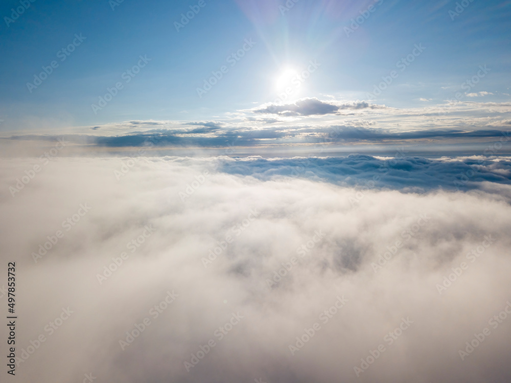High flight above the clouds. Aerial drone view. High flight above the clouds. Aerial drone view.