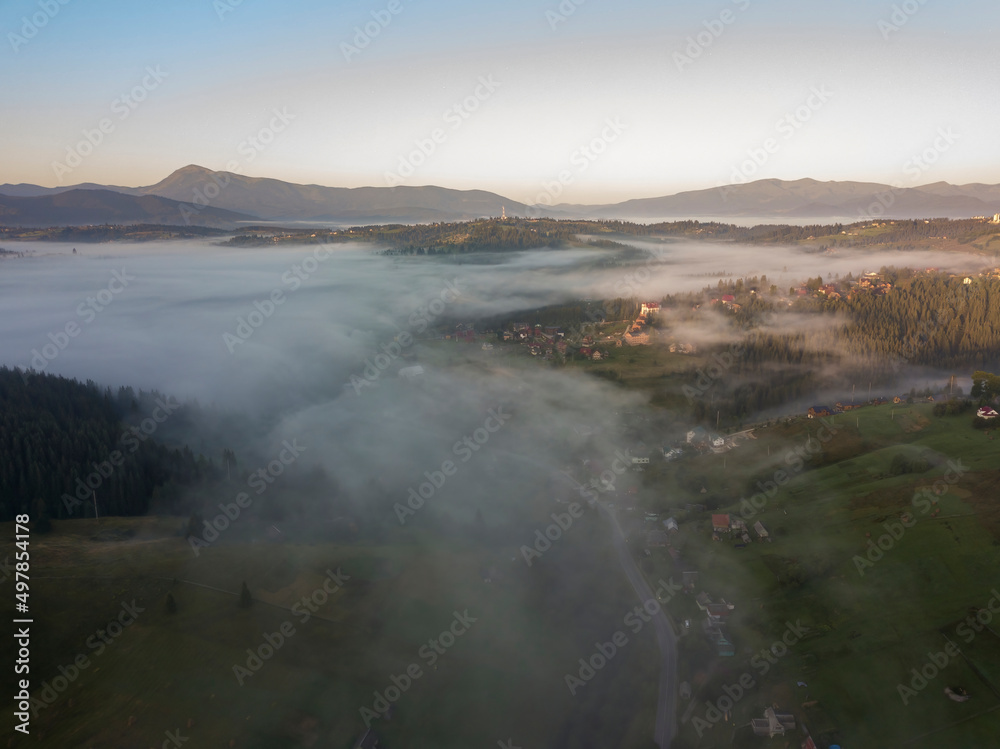 Morning fog in the Ukrainian Carpathians. Aerial drone view.