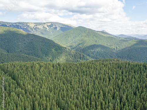 High mountains of the Ukrainian Carpathians in sunny weather. Aerial drone view.