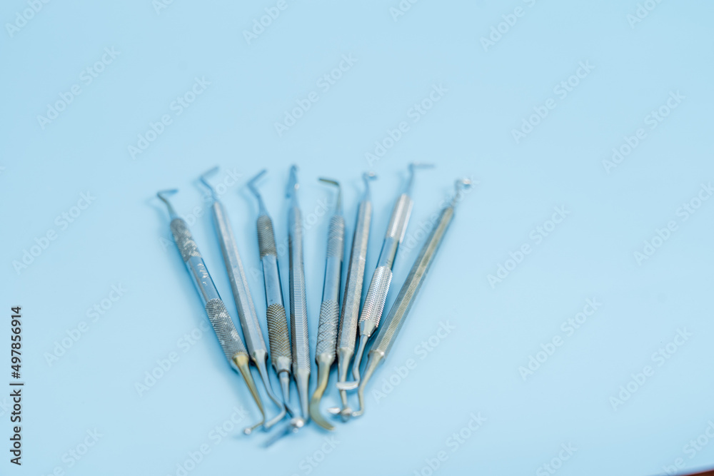 Dentist tool set. Teethcare, dental health concept. Blue background top view copy space Dentist tool set. Teethcare, dental health concept. Blue background top view copy space