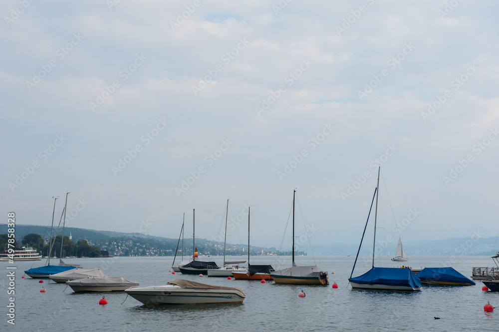 Boats and buoys on the Zurich lake Boats and buoys on the Zurich lake