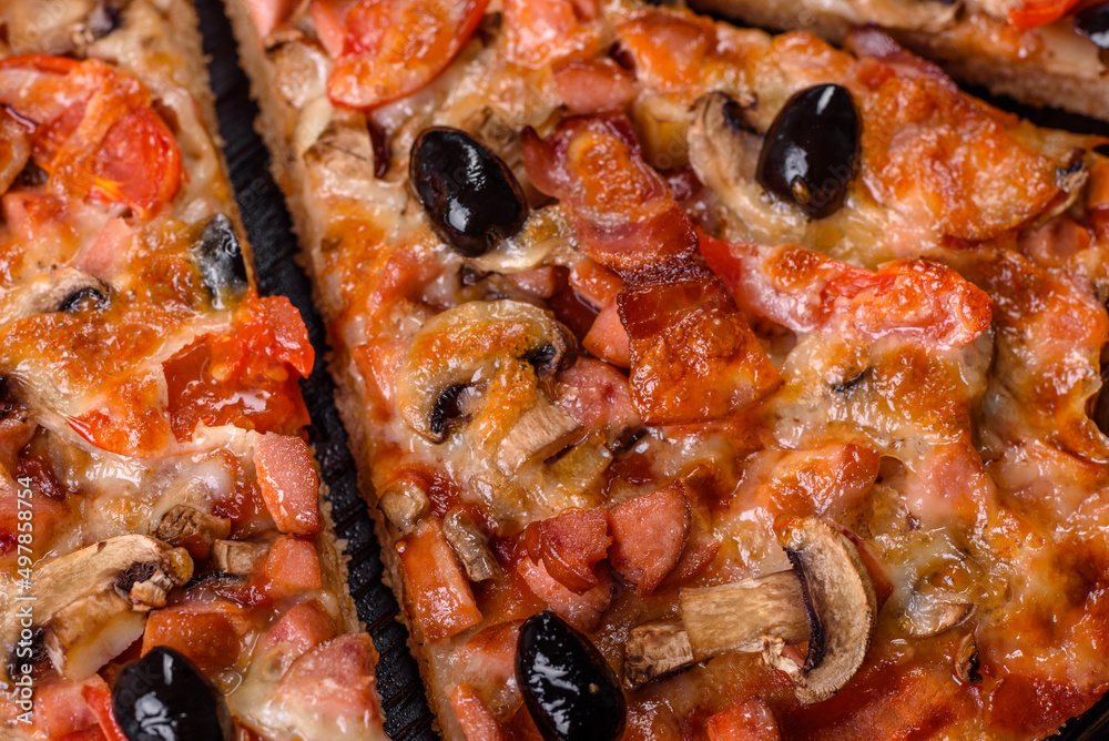 Homemade vegetable pizza with addition of tomatoes, olives and herbs Homemade vegetable pizza with addition of tomatoes, olives and herbs